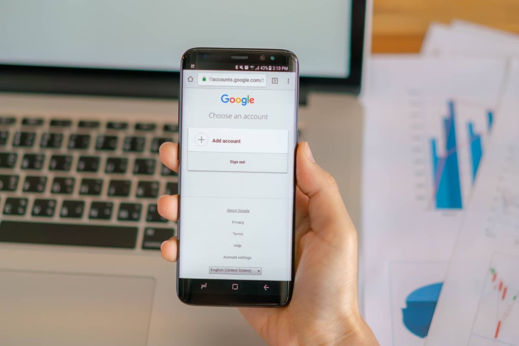 Person using Google on a smartphone to find a business online